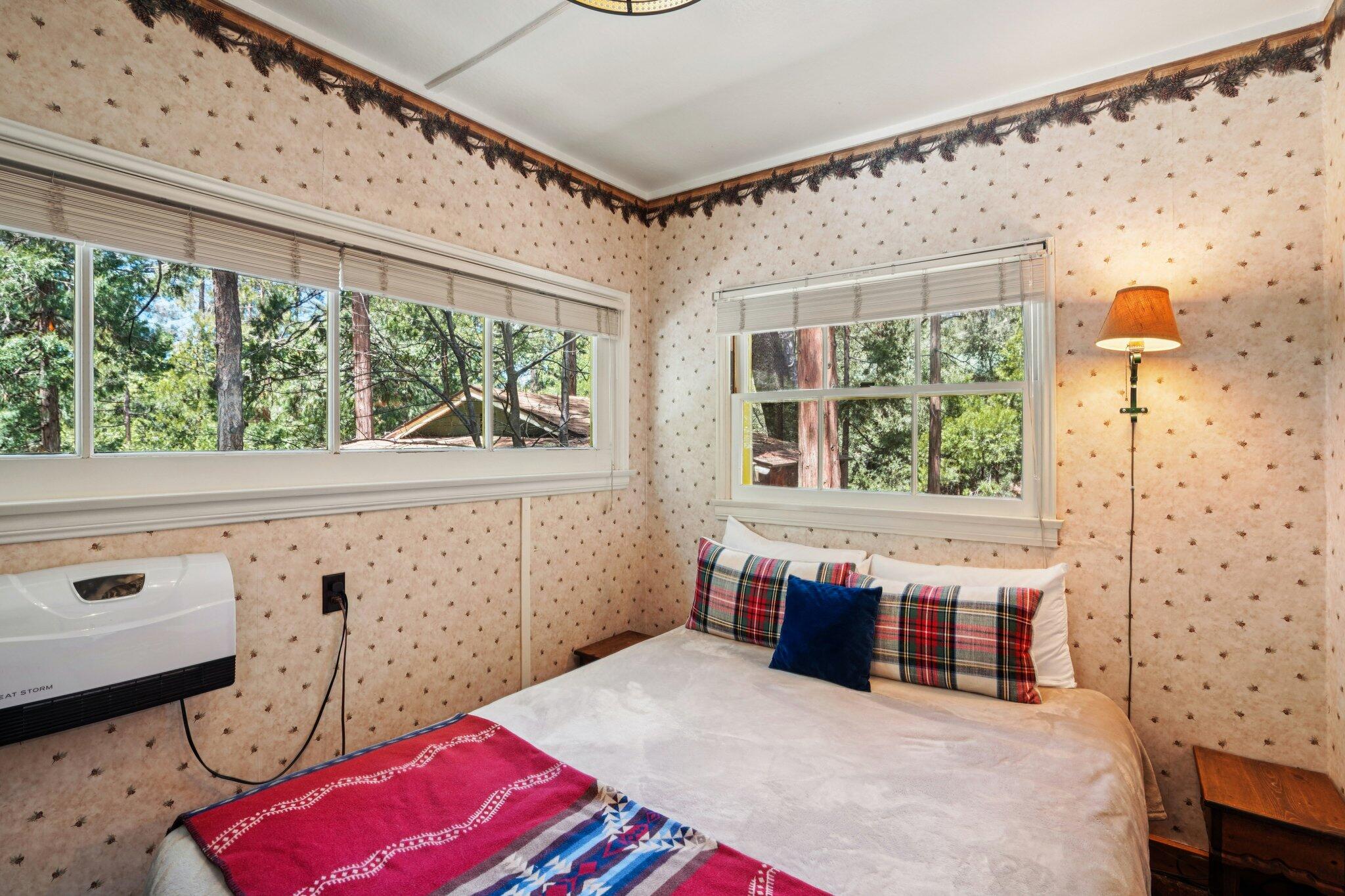 55280 Circle Way Idyllwild, CA 92549 - Photo 15 of 27 a bedroom with furniture and a large window