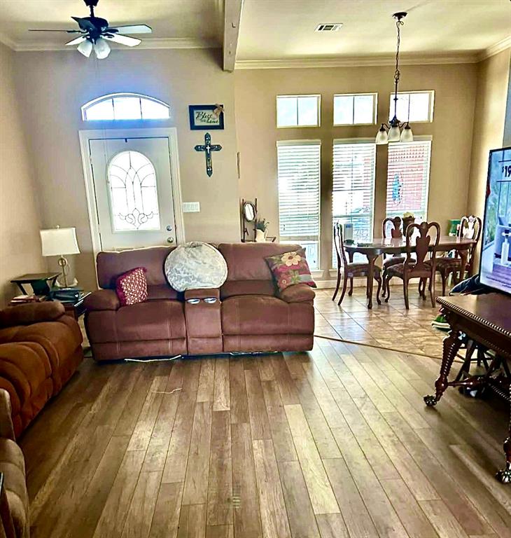 10127 Cougar Ridge Parkway Waco, TX 76708 - Photo 3 of 4 a living room with furniture and a large window