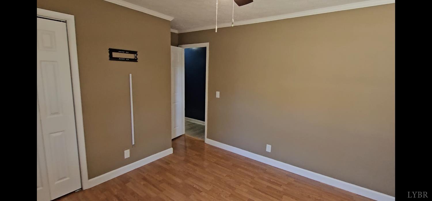 102 Ridgeview Road Hurt, VA 24563 - Photo 27 of 41 a view of empty room with wooden floor
