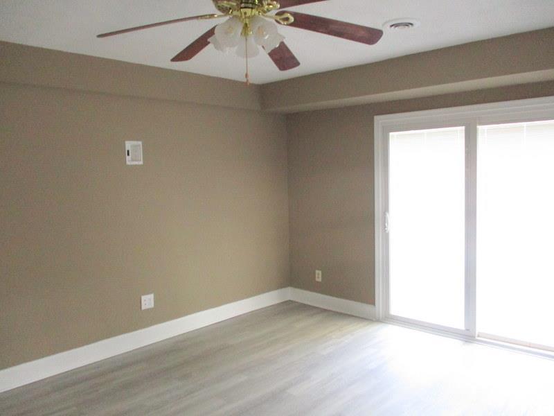 102 Ridgeview Road Hurt, VA 24563 - Photo 32 of 41 an empty room with a window and a ceiling fan