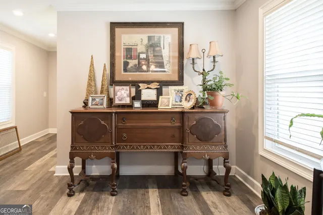 a utility room with sink dryer and washer