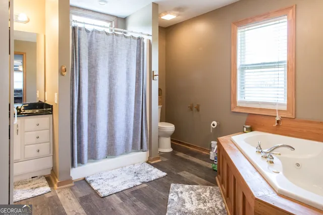 a view of a hallway with wooden shelves