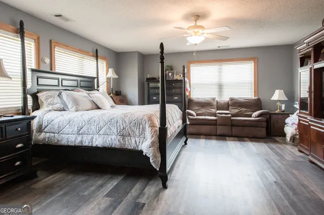 a bathroom with a toilet and a sink