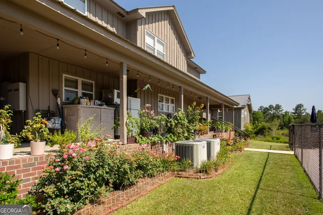 a front view of a house with patio