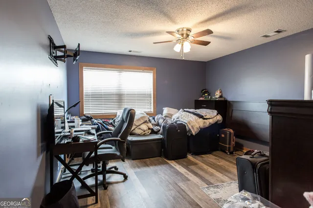 a bathroom with a toilet and a sink