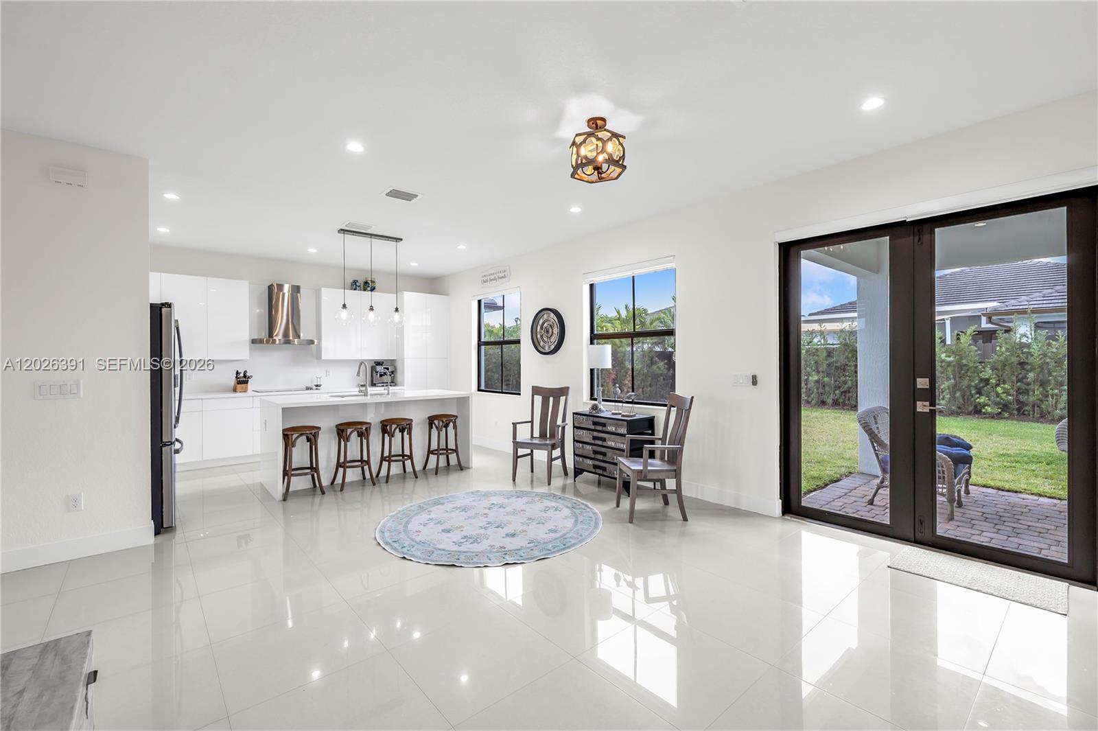 14606 Southwest 22nd Terrace Miami, FL 33175 - Photo 15 of 43 a view of kitchen with dining area and windows