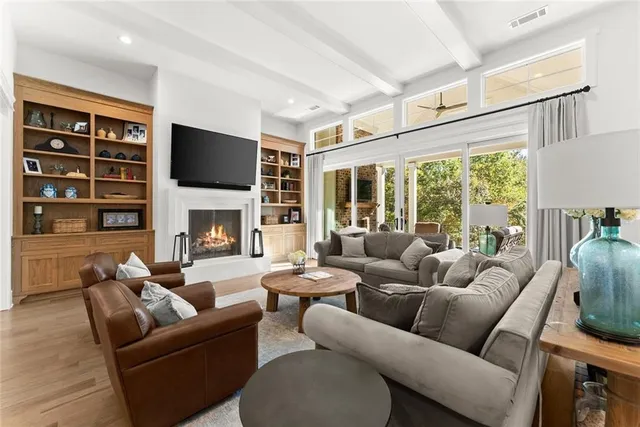 a spacious bedroom with a bed and a couch