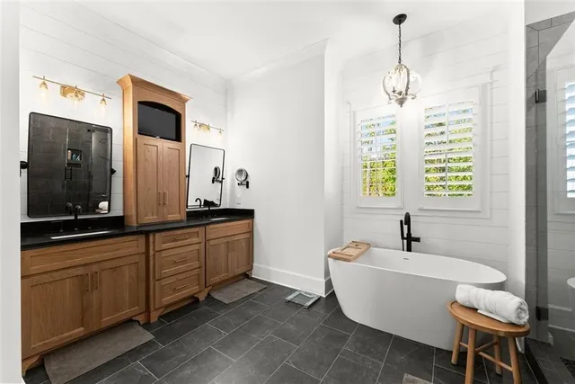 a kitchen with stainless steel appliances granite countertop a stove and a sink