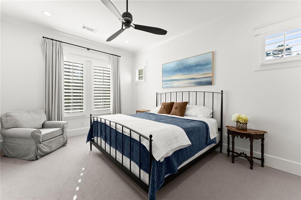 3116 Winding Lake Court Gainesville, GA 30504 - Photo 33 of 94 a bed sitting in a bedroom next to a window