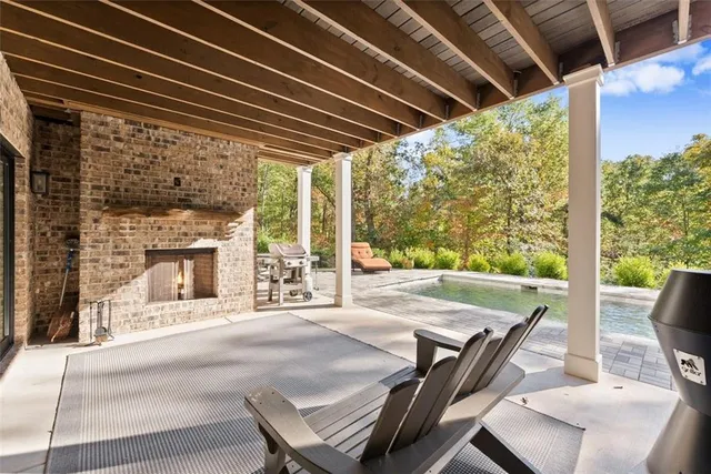 a view of a swimming pool with an outdoor space
