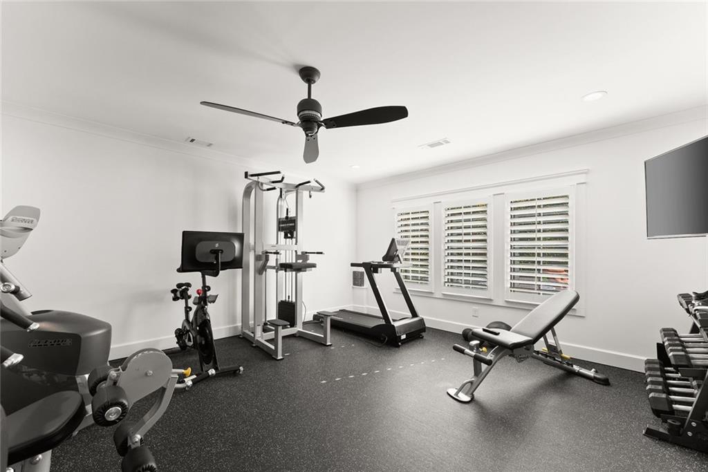 3116 Winding Lake Court Gainesville, GA 30504 - Photo 57 of 94 a view of a room with gym equipment