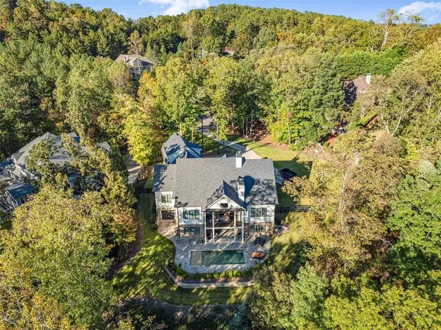 a living room with furniture fireplace and a flat screen tv
