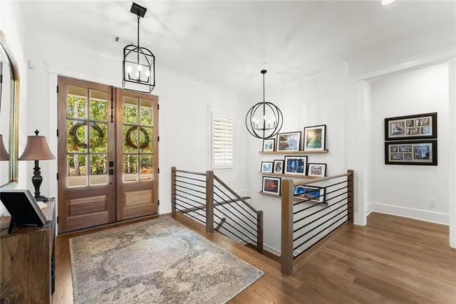 a view of a dining room with furniture and window
