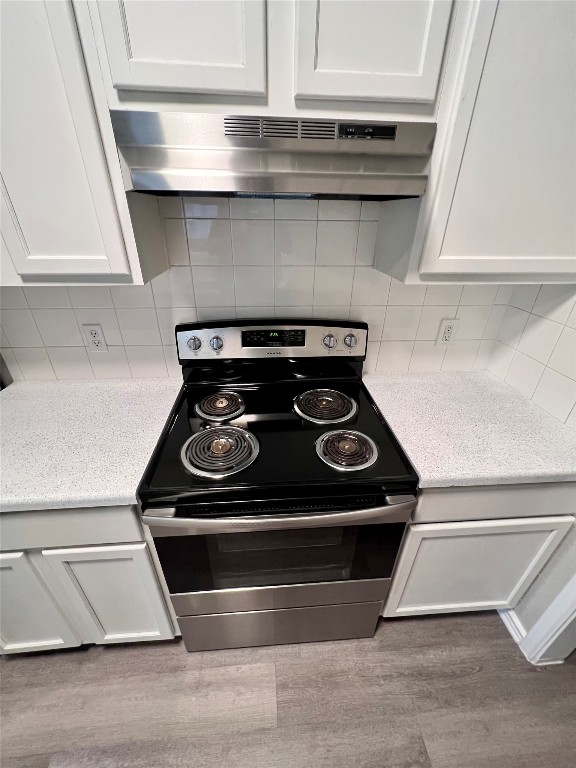 1801 Constantino Circle, Unit A Austin, TX 78745 - Photo 5 of 23 a stove top oven sitting inside of a kitchen