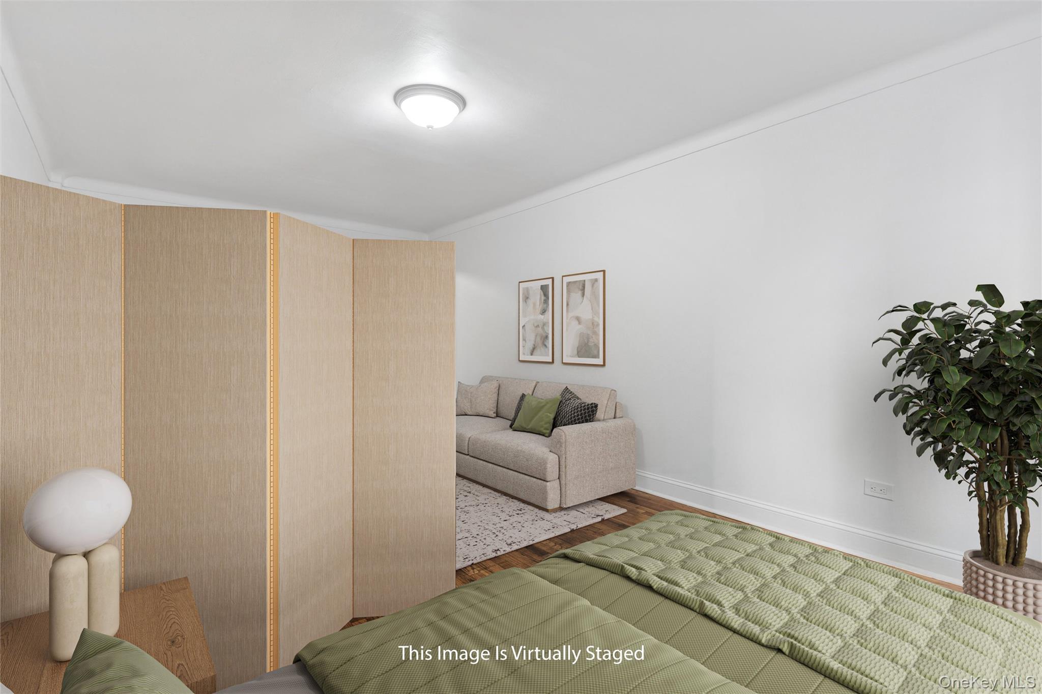 67-12 Yellowstone Boulevard, Unit B16 Queens, NY 11375 - Photo 3 of 15 Bedroom with wood finished floors and baseboards