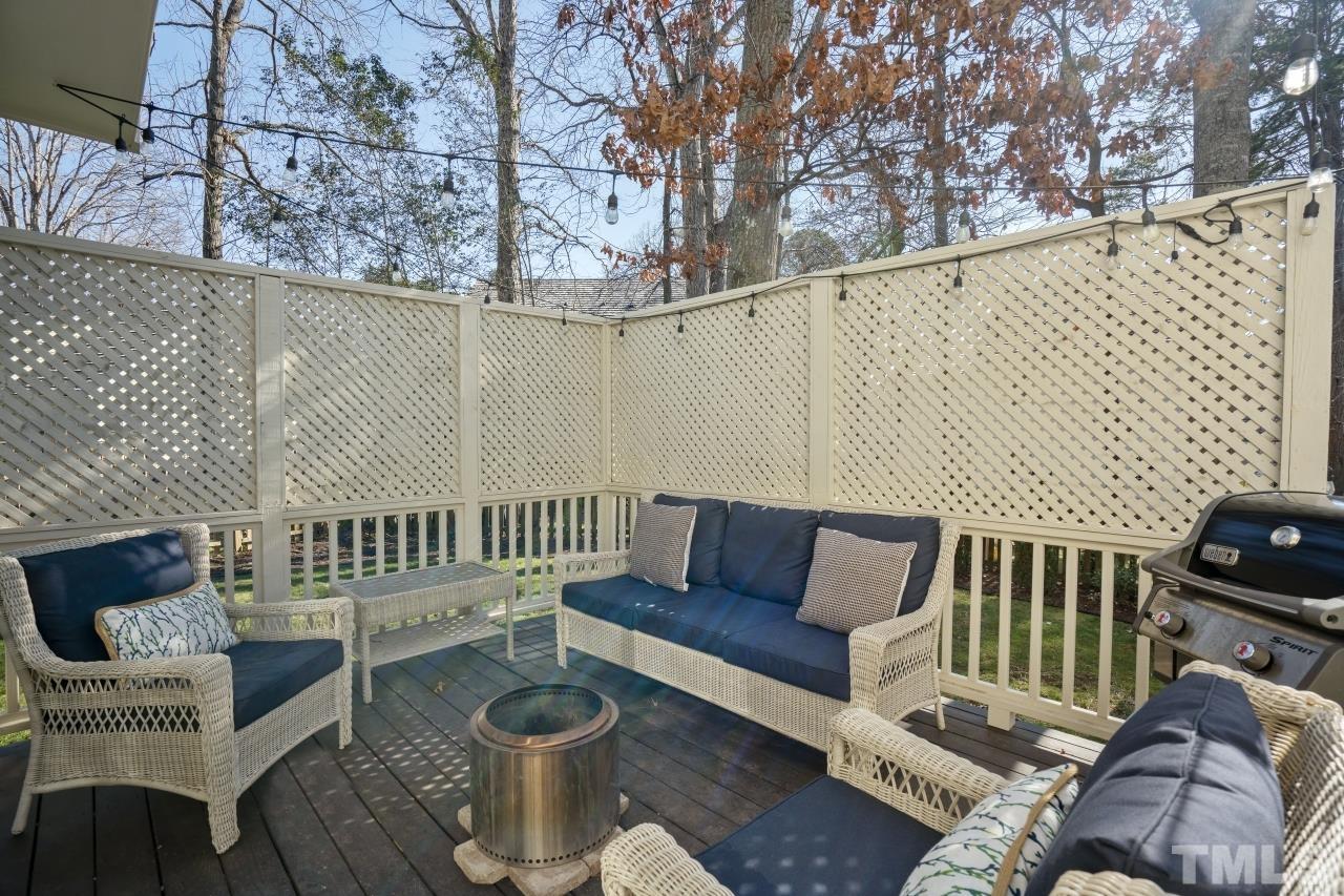 2209 Middlefield Court Raleigh, NC 27615 - Photo 23 of 25 a view of a chairs in wooden deck