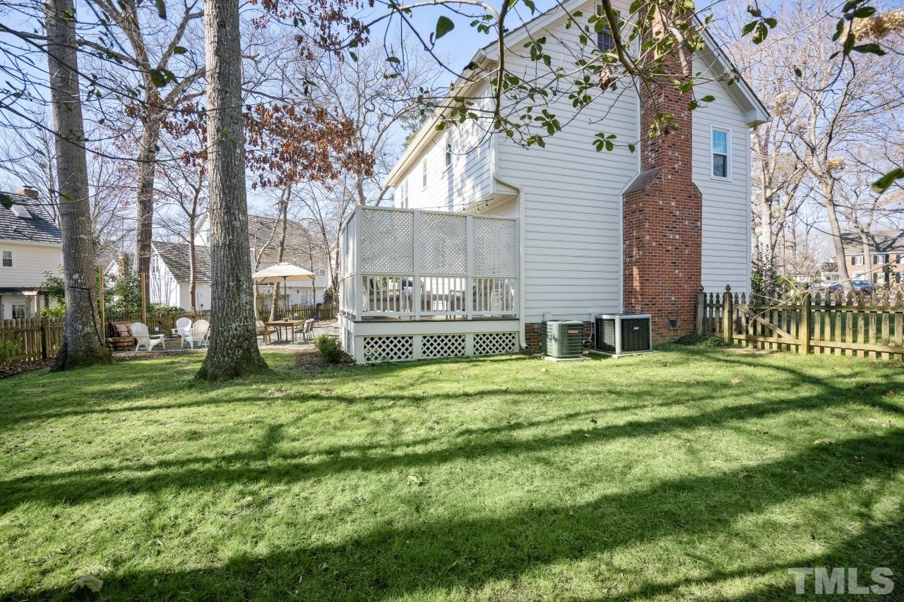 2209 Middlefield Court Raleigh, NC 27615 - Photo 24 of 25 a view of a house with a yard