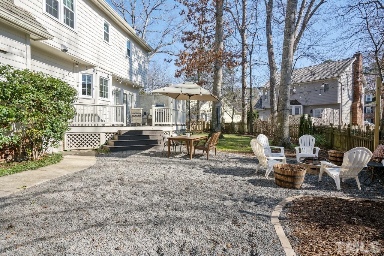 2209 Middlefield Court Raleigh, NC 27615 - Photo 25 of 25 a view of a building with backyard