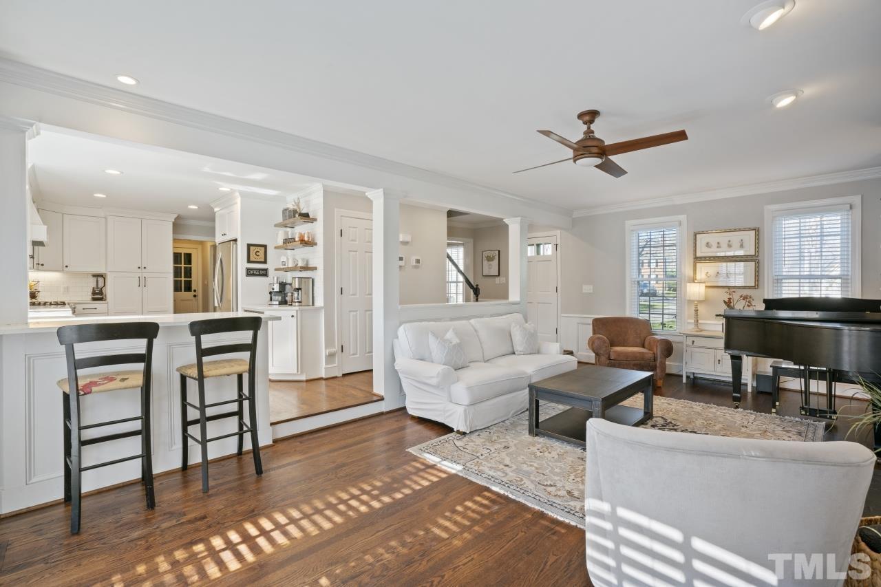 2209 Middlefield Court Raleigh, NC 27615 - Photo 6 of 25 a living room with furniture and kitchen view