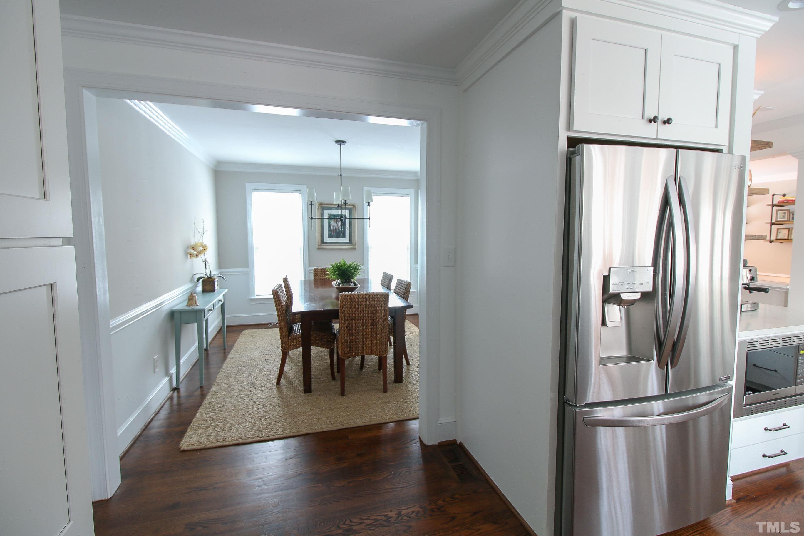 2209 Middlefield Court Raleigh, NC 27615 - Photo 9 of 25 a view of a dining room with furniture window and wooden floor