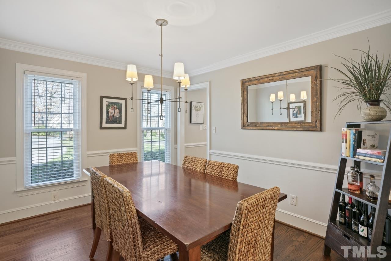 2209 Middlefield Court Raleigh, NC 27615 - Photo 10 of 25 a view of a dining room with furniture window and wooden floor