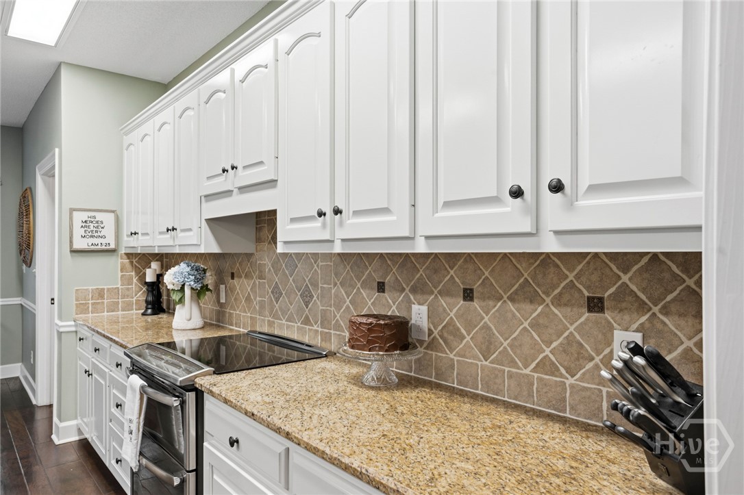 129 Cambridge Drive Rincon, GA 31326 - Photo 6 of 37 kitchen cabinets