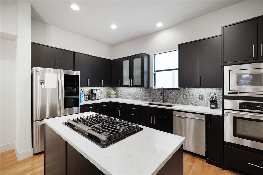 4618 Cedar Springs Road, Unit C Dallas, TX 75219 - Photo 2 of 14 Kitchen W/ Island