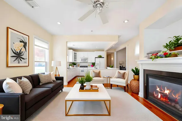 a view of a patio with table and chairs potted plants