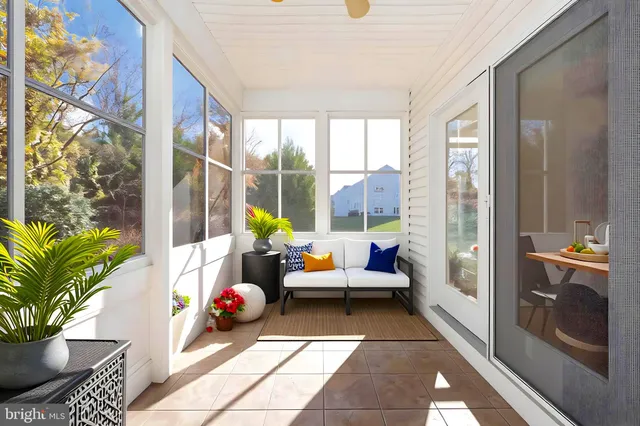 a spacious bedroom with a bed and a window
