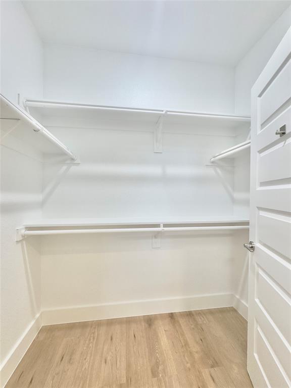 3801 Carpenter Avenue Dallas, TX 75210 - Photo 13 of 19 a view of an empty walk in closet