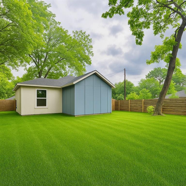 3801 Carpenter Avenue Dallas, TX 75210 - Photo 2 of 19 a house with a tree in front of it