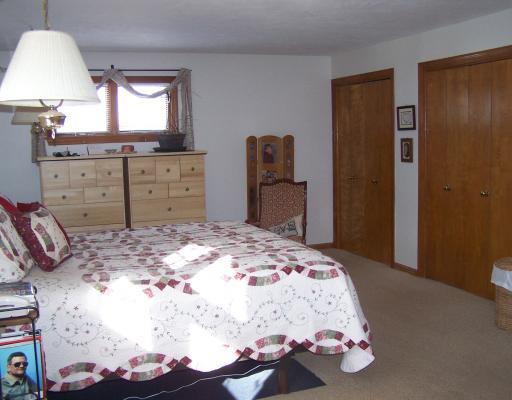 Master Bedroom. The master bedroom is spacious and offers plenty of storage space!