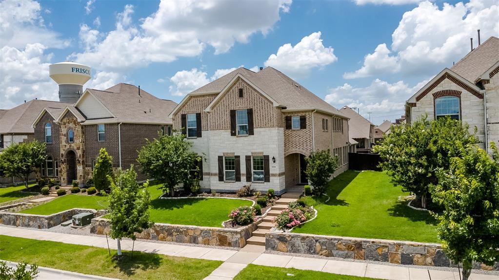6333 Hall Road Frisco, TX 75034 - Photo 2 of 38 Two-story residence featuring a combination stone and brick facade