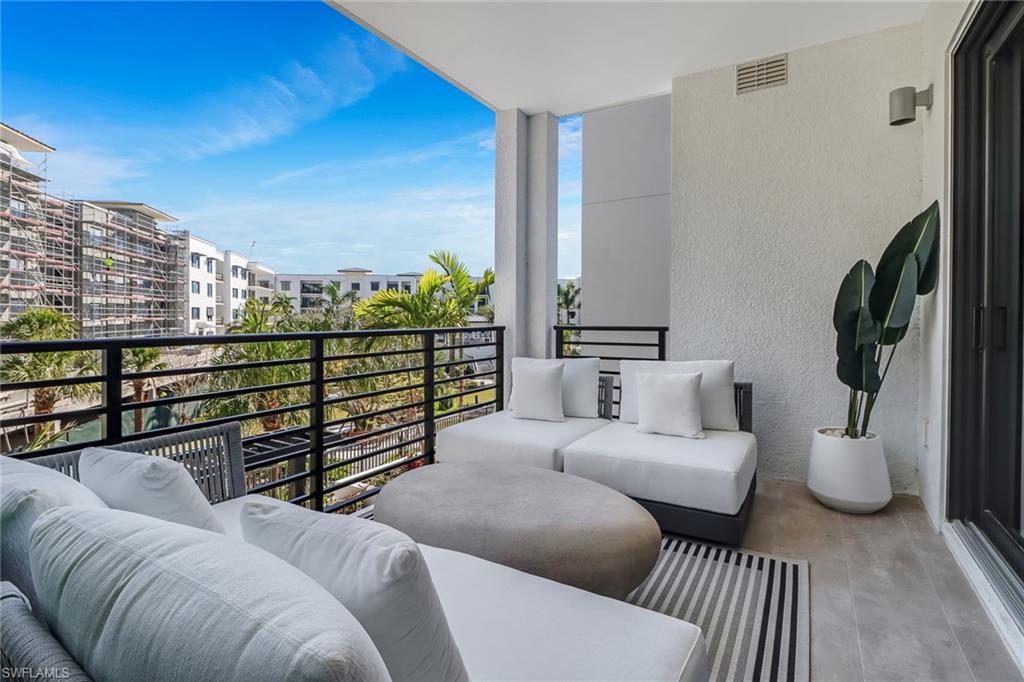 1115 Central Avenue, Unit 340 Naples, FL 34102 - Photo 12 of 39 a living room with furniture