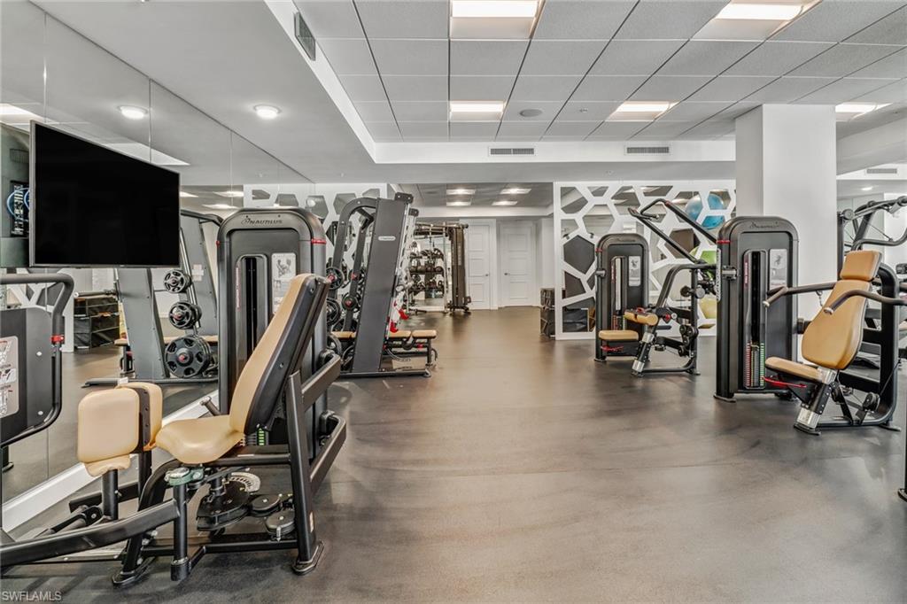 1115 Central Avenue, Unit 340 Naples, FL 34102 - Photo 28 of 39 a view of a room with gym equipment
