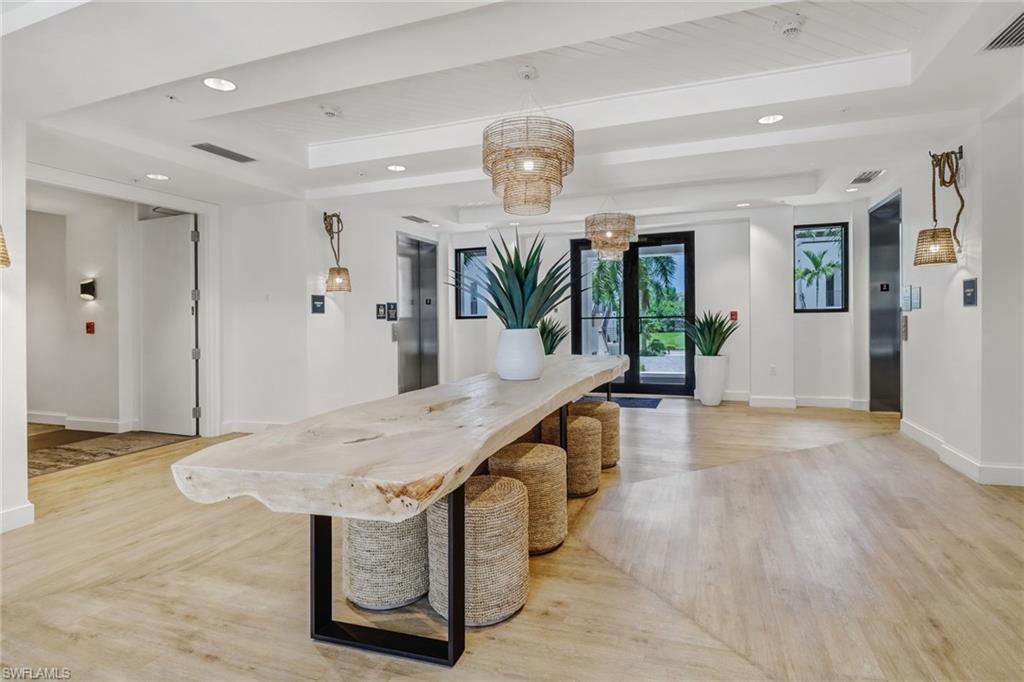1115 Central Avenue, Unit 340 Naples, FL 34102 - Photo 33 of 39 a view of entryway and kitchen