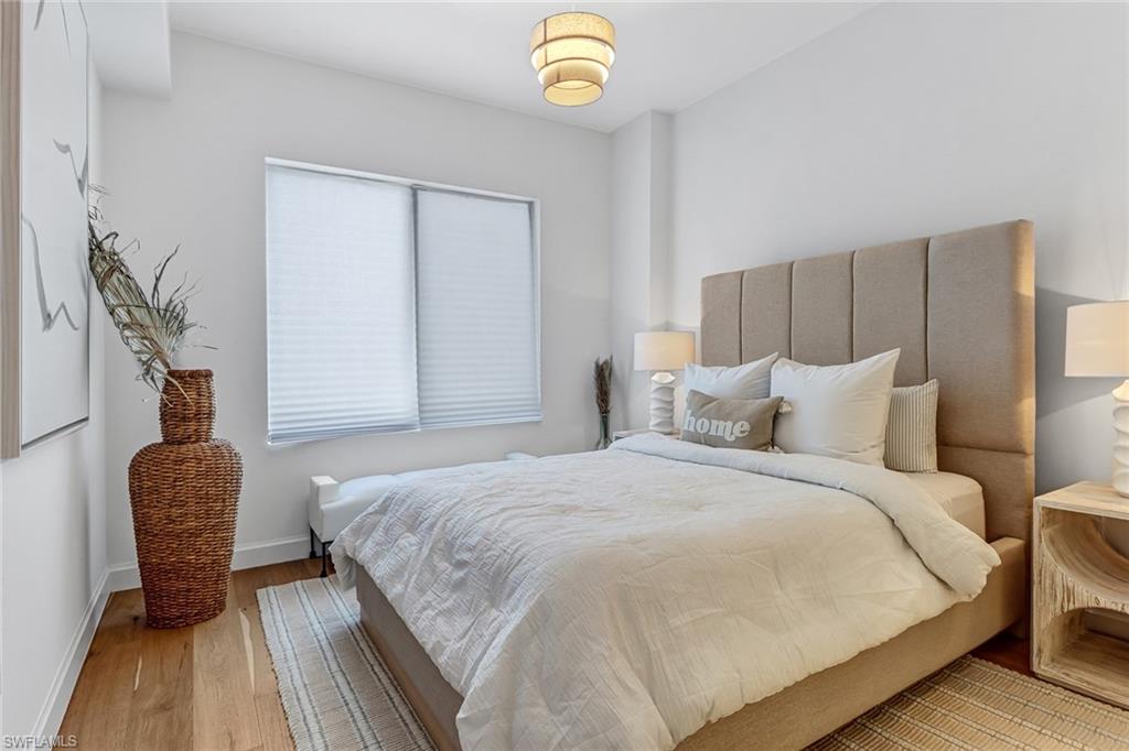 1115 Central Avenue, Unit 340 Naples, FL 34102 - Photo 37 of 39 a bedroom with bed and a window