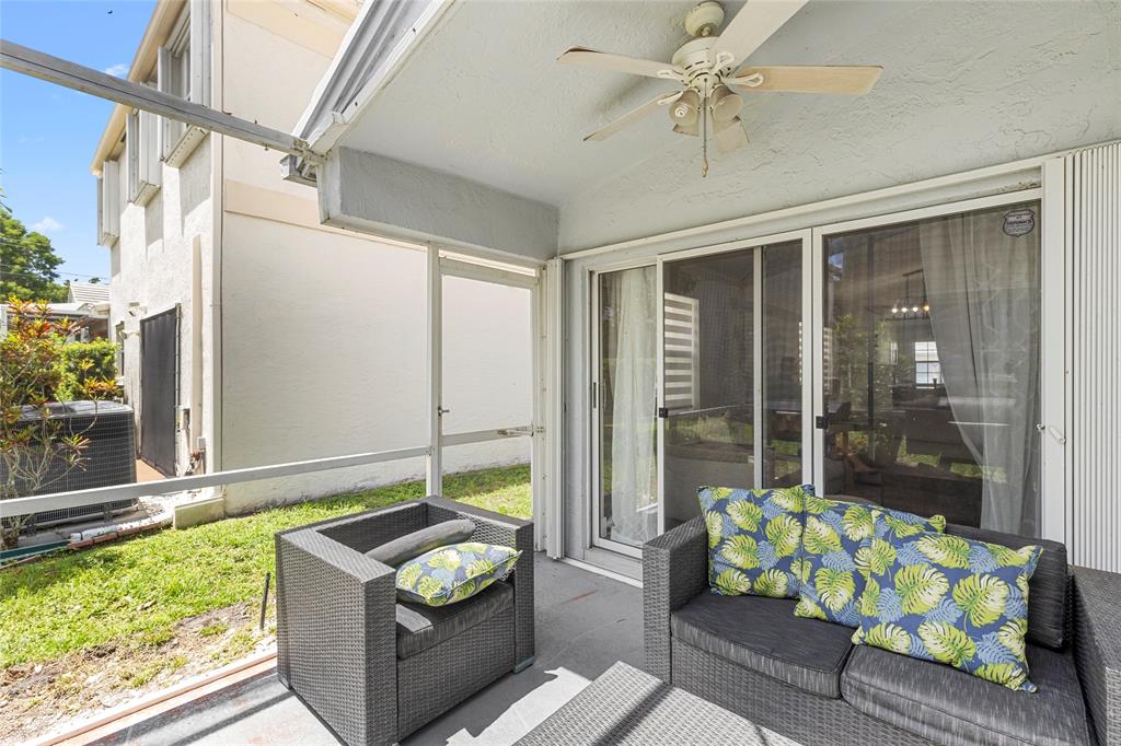 9424 Northwest 8th Circle Plantation, FL 33324 - Photo 12 of 57 a outdoor living space with furniture and a garden