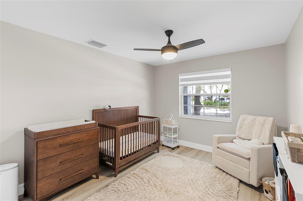 9424 Northwest 8th Circle Plantation, FL 33324 - Photo 31 of 57 a living room with furniture and a window