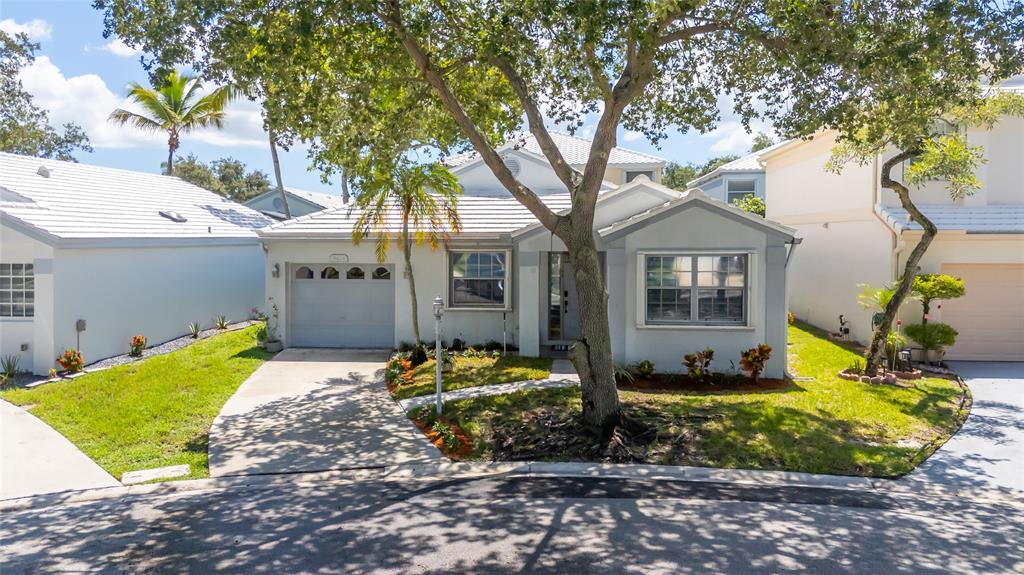 9424 Northwest 8th Circle Plantation, FL 33324 - Photo 57 of 57 a front view of a house with garden