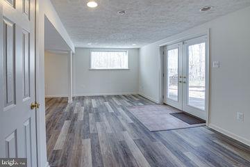 12902 Sturbridge Road Woodbridge, VA 22192 - Photo 31 of 40 Double Doors Leading out to the Private Backyard