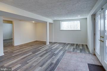 12902 Sturbridge Road Woodbridge, VA 22192 - Photo 32 of 40 Sun Filled Lower Level Entertainment Area