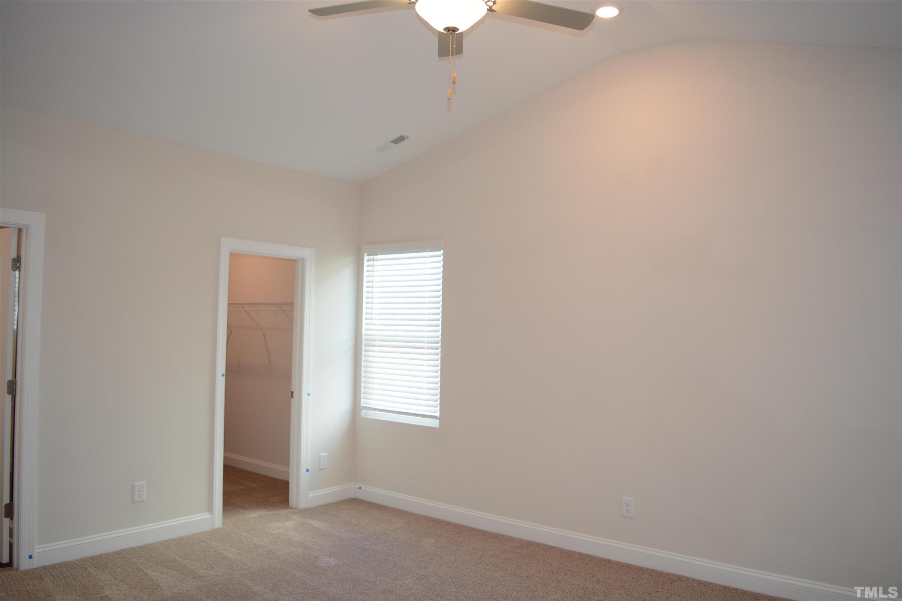 45 Level Drive Youngsville, NC 27596 - Photo 3 of 7 a view of an empty room with a window