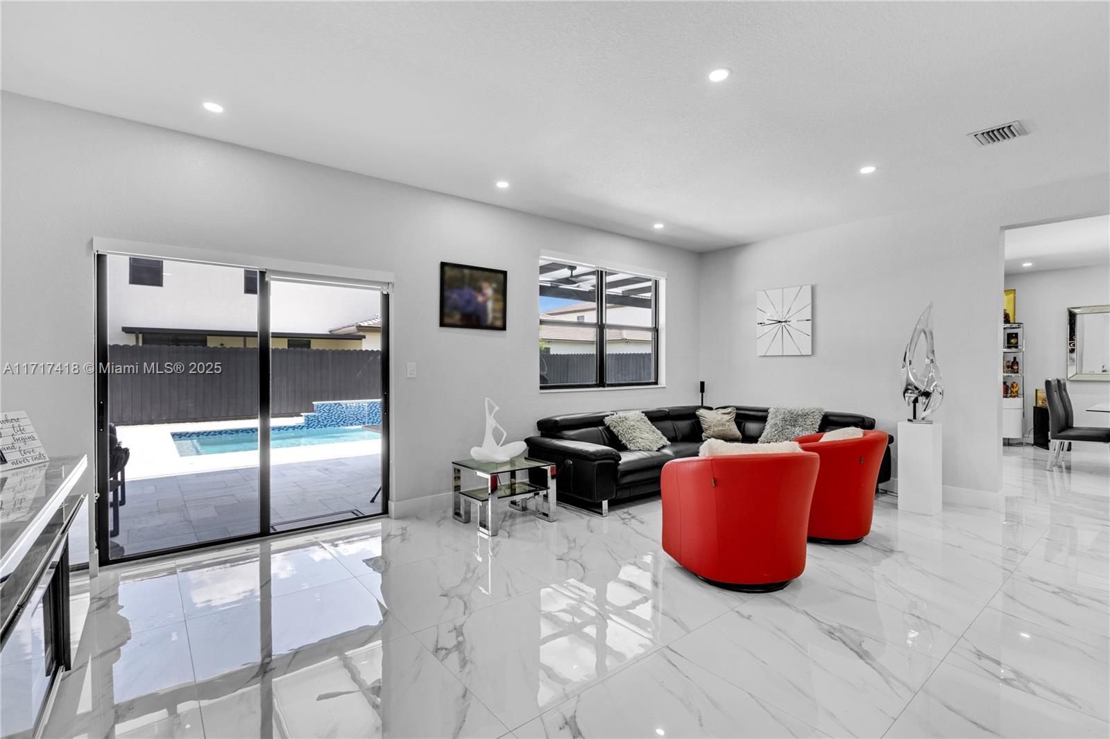 12953 Southwest 230th Street Miami, FL 33170 - Photo 15 of 49 a living room with furniture