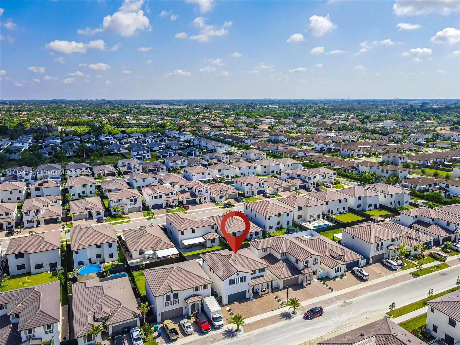 12953 Southwest 230th Street Miami, FL 33170 - Photo 43 of 49 an aerial view of a city