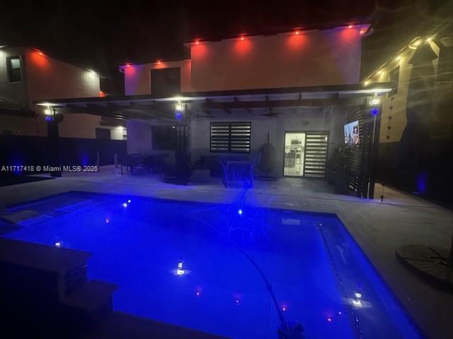 12953 Southwest 230th Street Miami, FL 33170 - Photo 49 of 49 a room with pool table and windows