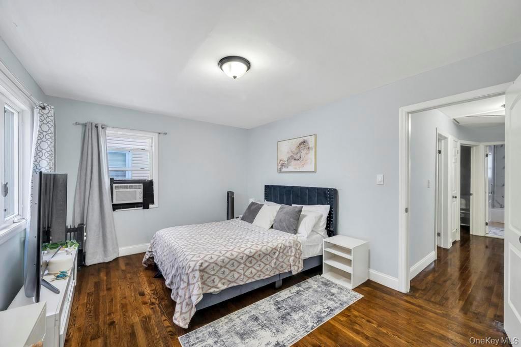178-26 Zoller Road Queens, NY 11434 - Photo 24 of 26 a bedroom with a bed and wooden floor