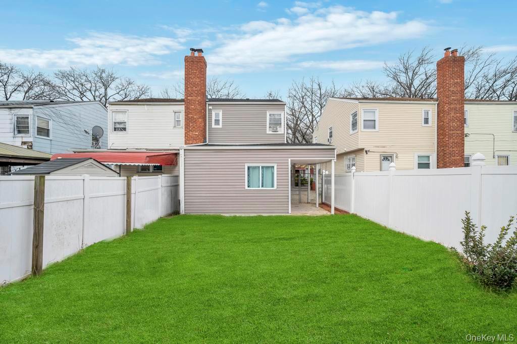 178-26 Zoller Road Queens, NY 11434 - Photo 26 of 26 a front view of a house with garden