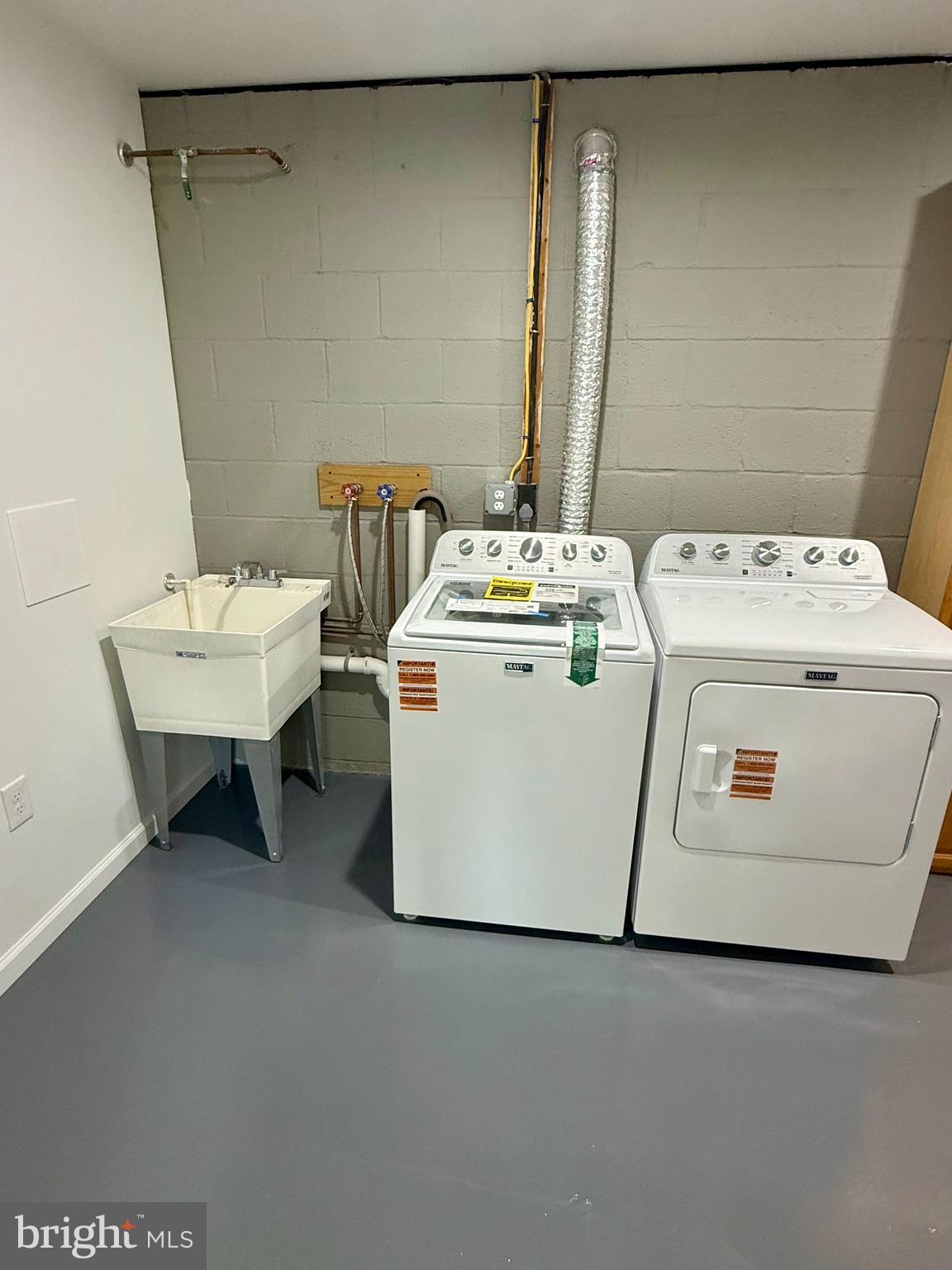 3600 4th Street North Beach, MD 20714 - Photo 17 of 32 a utility room with dryer and washer