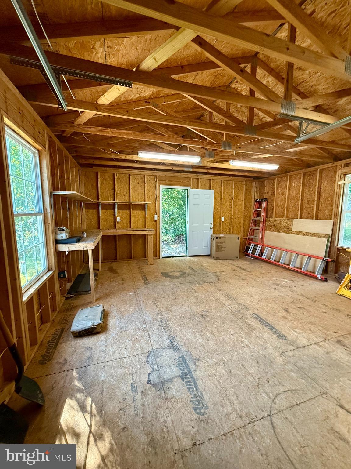 3600 4th Street North Beach, MD 20714 - Photo 19 of 32 a view of a room with wooden walls and furniture